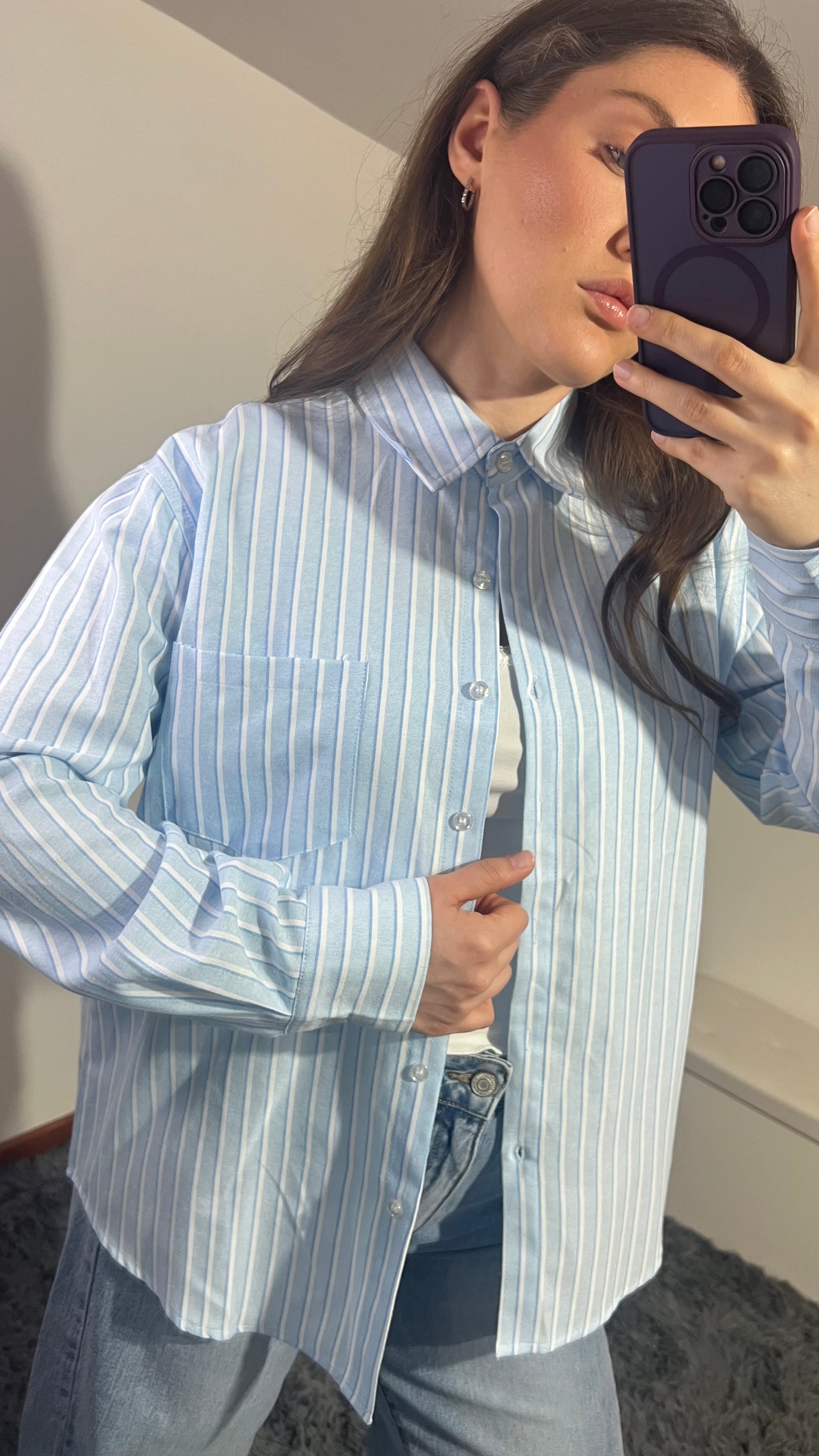 Camicia a righe rosa e azzurro