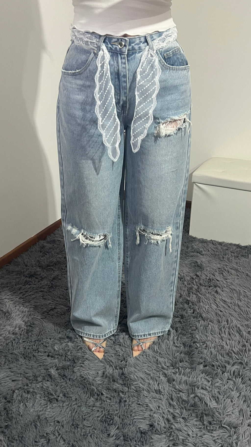 Jeans pizzo con strappi